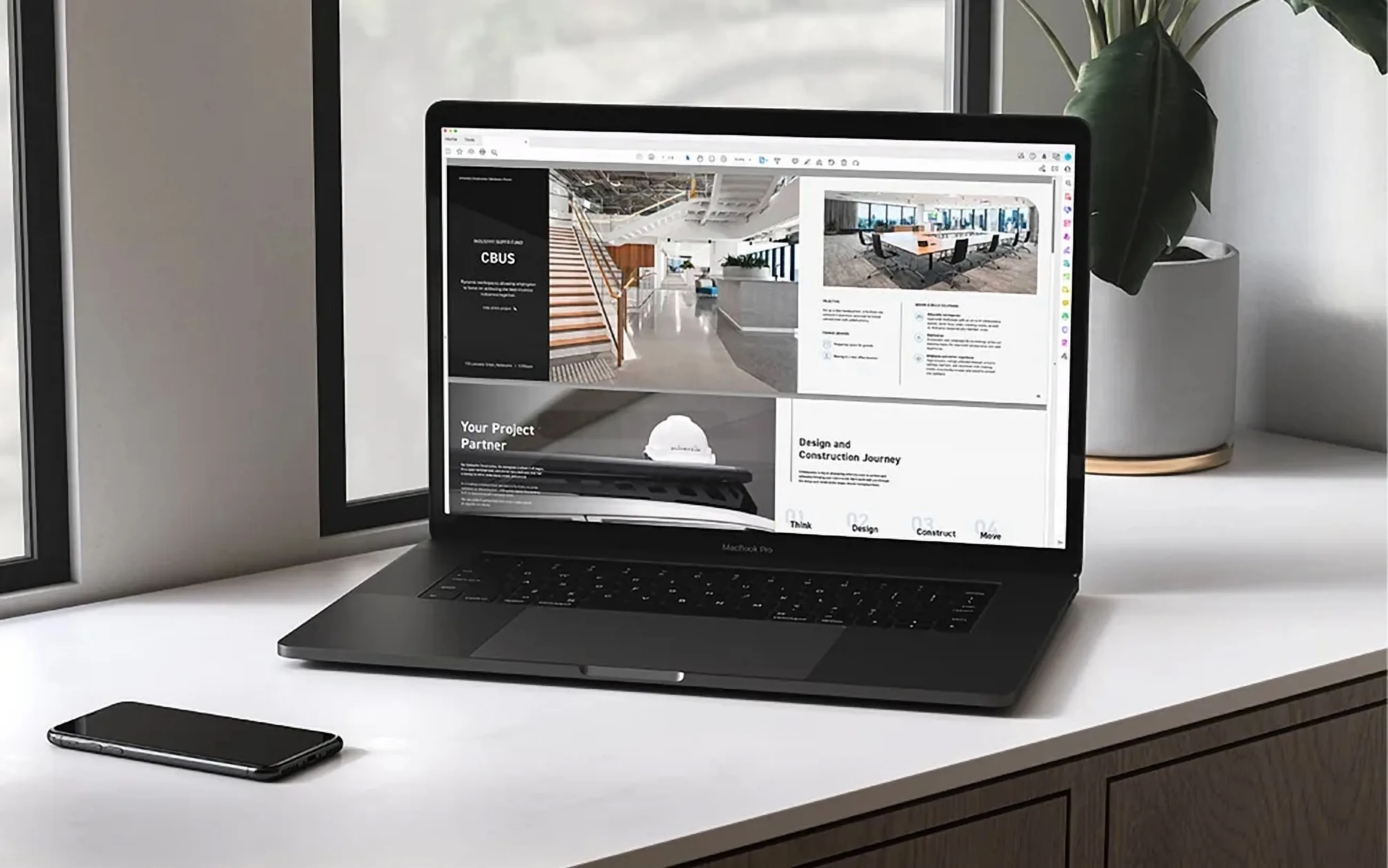 Schiavello Construction website on a laptop