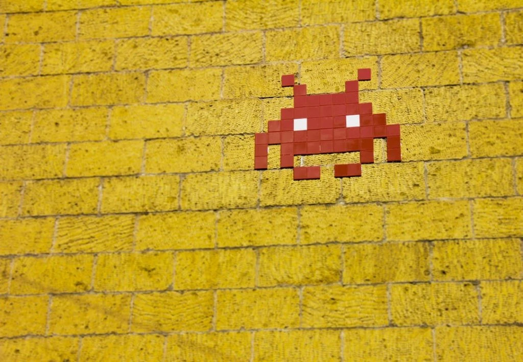 Space invader Game Icon On Yellow Wall